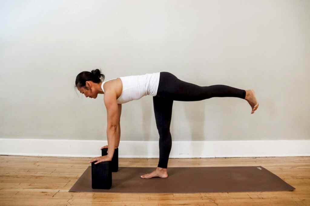 yoga practitioner using the mat